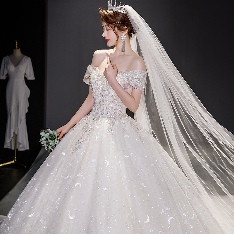 ワンショルダーメインウェディングドレス2025花嫁ビッグテールスターラリースカイプリンセススタイル厚い腕を覆う小さな人