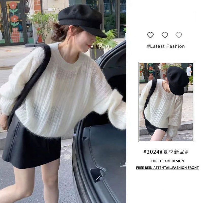 女性向けのファッショナブルでファッショナブルなスーツ初秋新しいルーズラウンドネックセータートップブラックショートスカート2ピーススーツ