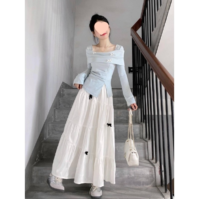 オフショルダーのトップス長袖ニットロングスカートを合わせたデザインが清楚で魅惑的な早春のワンピースです