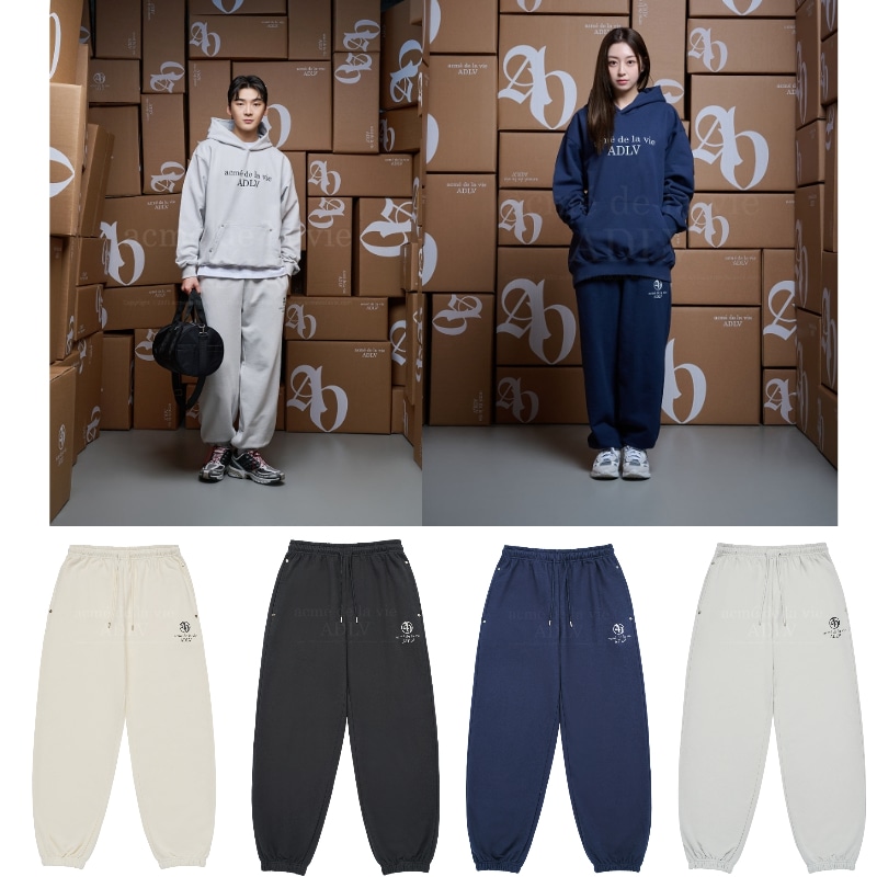 【SEVENTEENジョンハン着用】CIRCLE SYMBOL RIVET PANTS スウェットパンツ