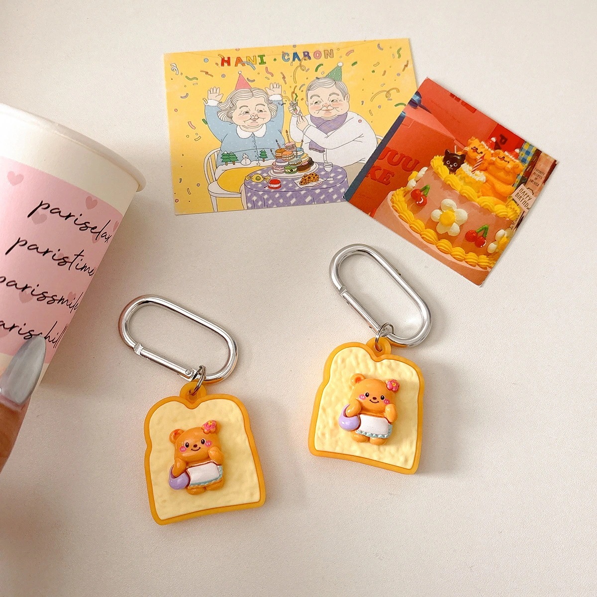 【200点セット】【送料無料】バターベアートーストトラッカー保護カバーアップルAirTagロケータワイヤー紛失防止キーホルダー適用