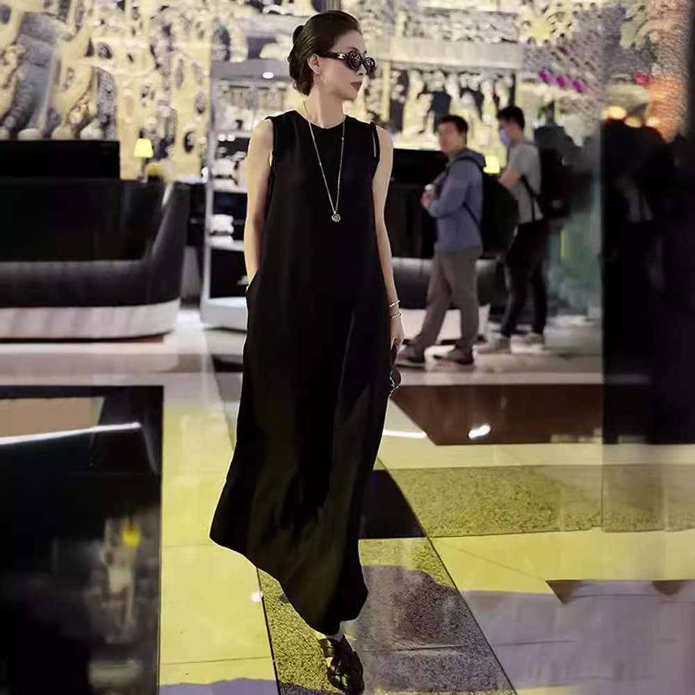 冷たくてロイヤル姉妹スタイルフランスのブラックノースリーブドレスハイエンドの気質のドレス2023年夏の女性のためのセレブスカート