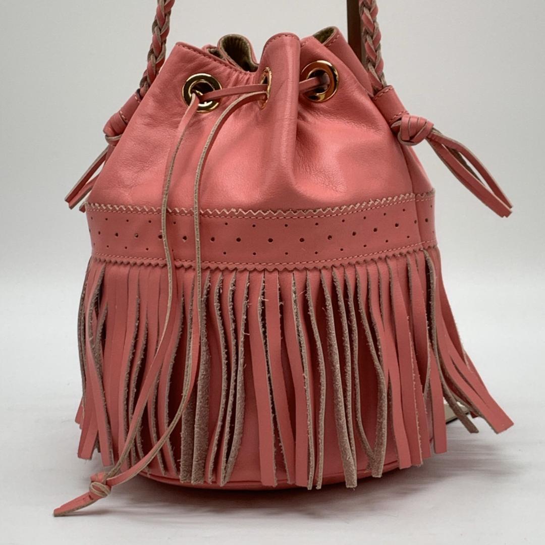 ハンド ショルダーバッグ ワンショルダー 肩掛け レザー 本革 ピンク カーニバル 巾着 フリンジ