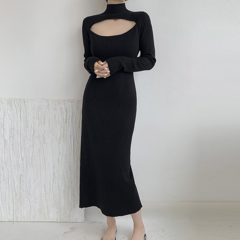 秋冬の新商品の高襟の透かし彫りの修身弾力の中で長いニットのワンピースの女性