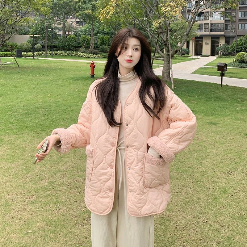 綿服復古的なつなぎ合わせは保温的でゆるい綿服の女性コートを厚くした アウターフリースで決まり