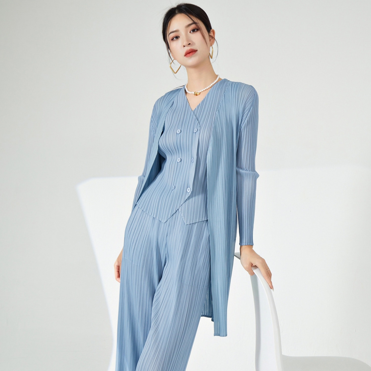 風衣女の中長の高級春秋薄い秋の小柄なしわのコートの女性の外はカーディガン