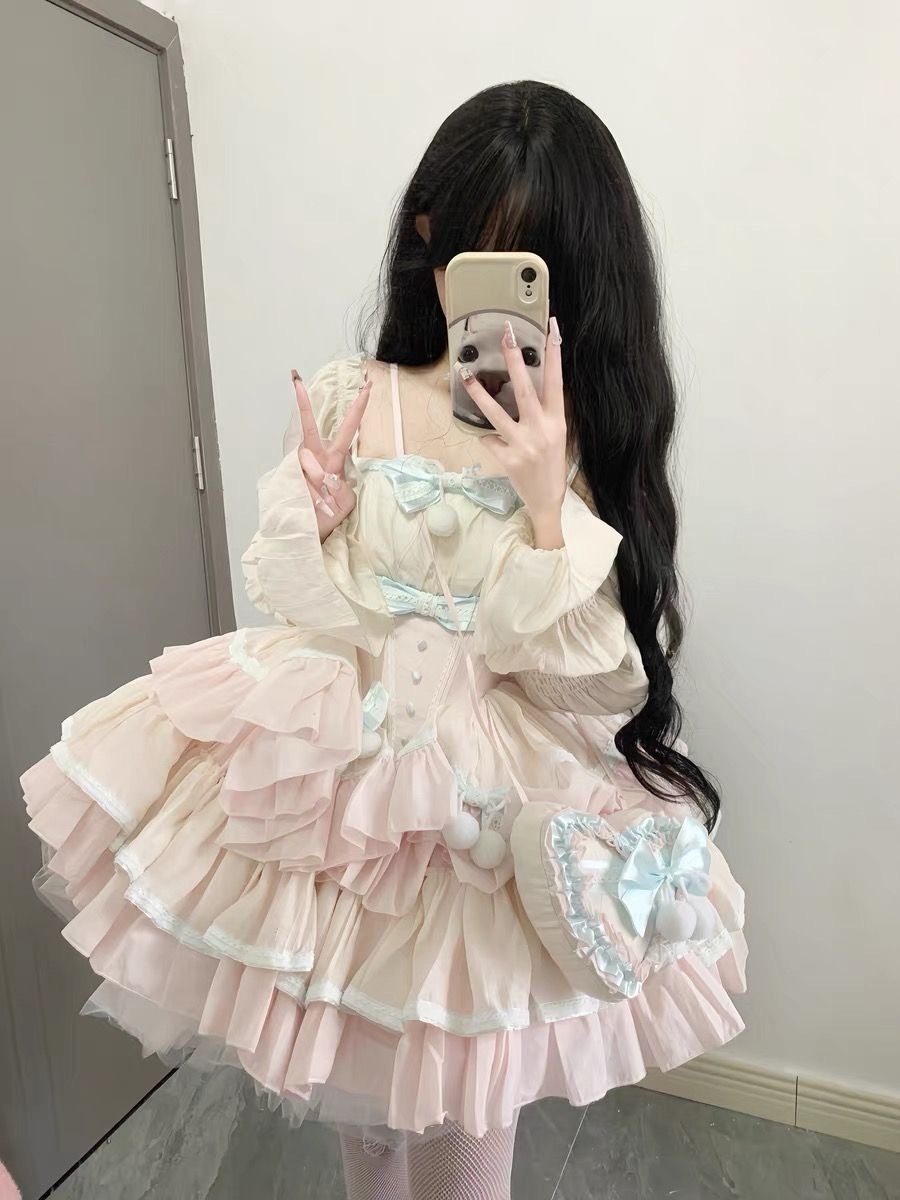 丈夫でガーリーなリボンコントラストカラーのステッチウエスト女性用のスタイリッシュなパフスカートが付いた年齢を軽減する甘いロリータプリンセスドレス