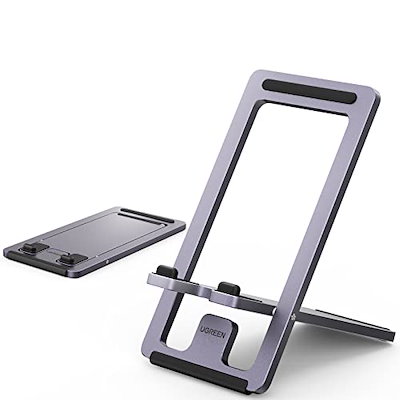 他サイト： UGREEN スマホスタンド 薄型 アルミ合金製 持ち運びに便利 iphoneスタンド 折りたたみ式 卓上 角度変換可 4.7-6.8インチのiPhone Android 携帯スタンドの商品画像