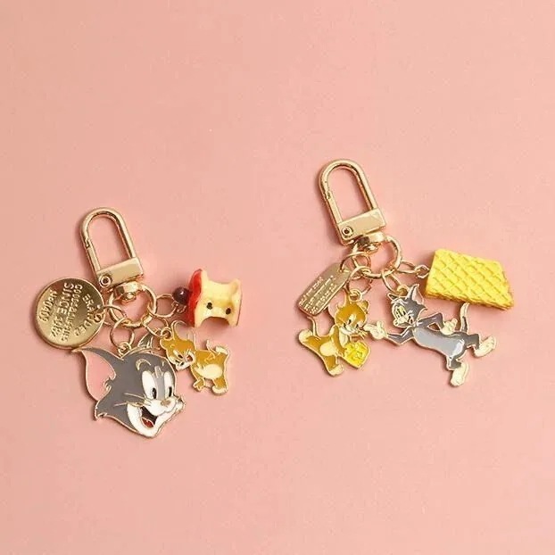 トムとジェリーの猫とマウスの合金キーホルダーAirpods保護ケース紛失防止装飾ペンダントの装飾