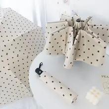 スタイリッシュな水玉模様の自動折りたたみ傘 UPF 50+ ブラック コーティングされた太陽と雨の保護コンパクト旅行傘