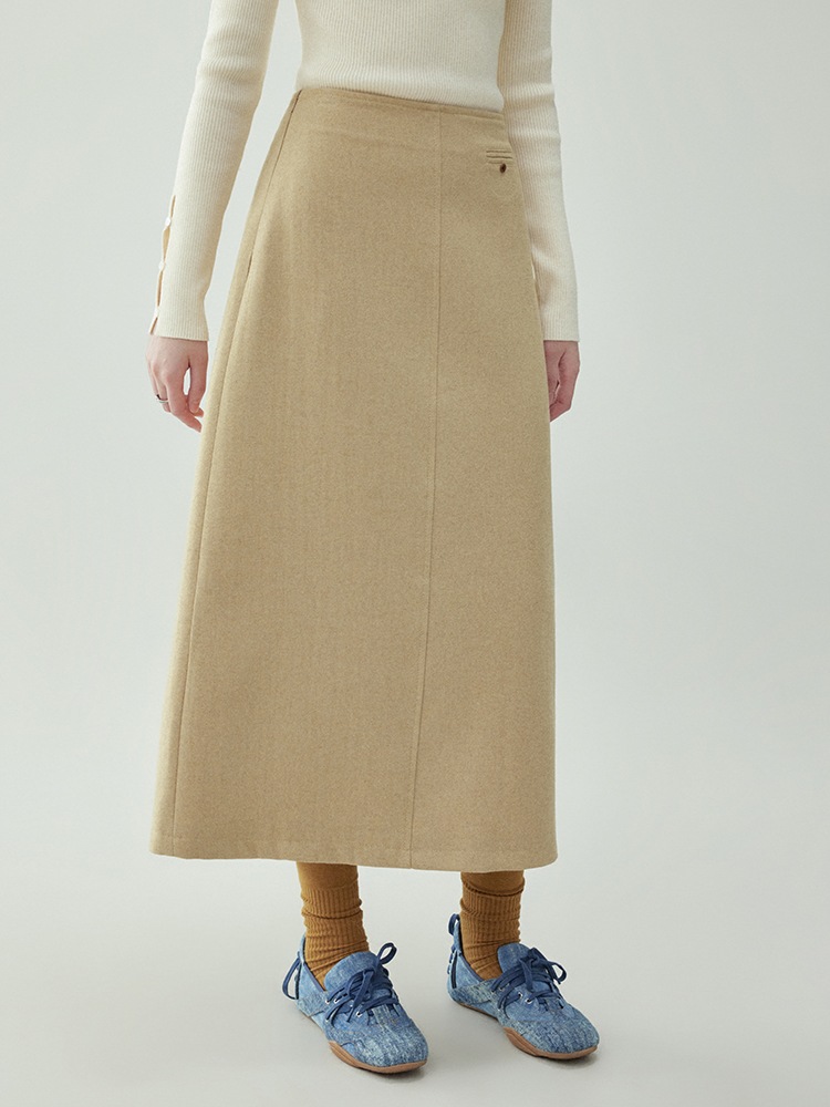 純色の高い腰の後ろにa字の毛の半身のスカートの女性の秋冬の新型の半スカートの中で長いスカートを開きます