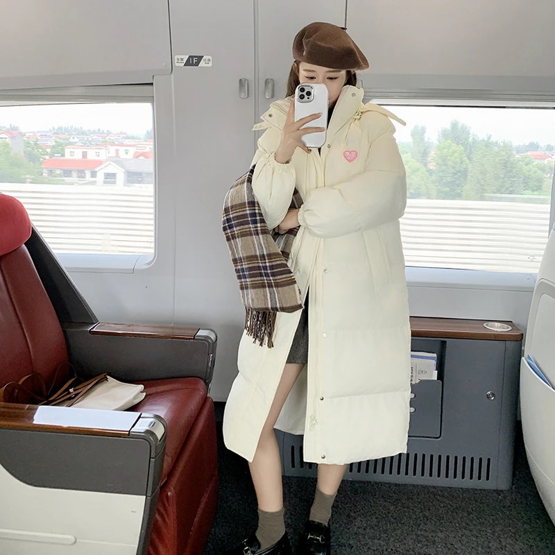 韓系2024冬学院風ダウン綿服は保温中の長いタイプの帽子付きパン服綿入れコートの女性を厚くした
