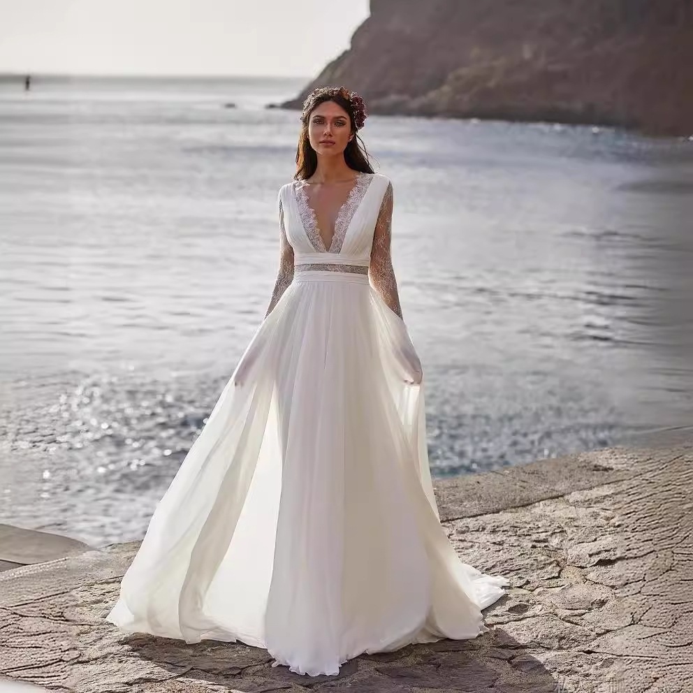 春の新型長袖の小さい尾の旅行は屋外の軽いウェディングドレスをたたいてショーのドレスを歩きます