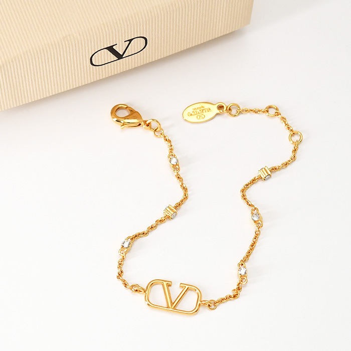 ブレスレット アクセサリー J0W24 YCW Vロゴシグネチャー メタル スワロフスキー クリスタル レディース ゴールド