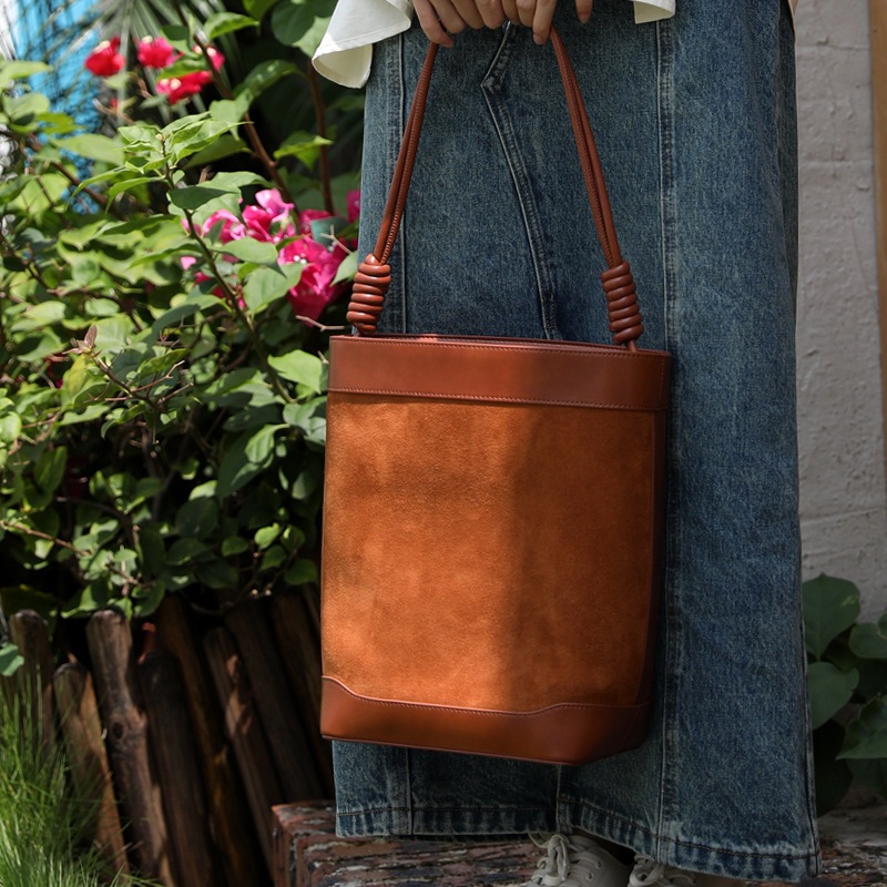 フロスト牛革バケツバッグ女性結び麻花ひもシングルバッグ怠惰風腋の下バッグ百合通勤バッグ