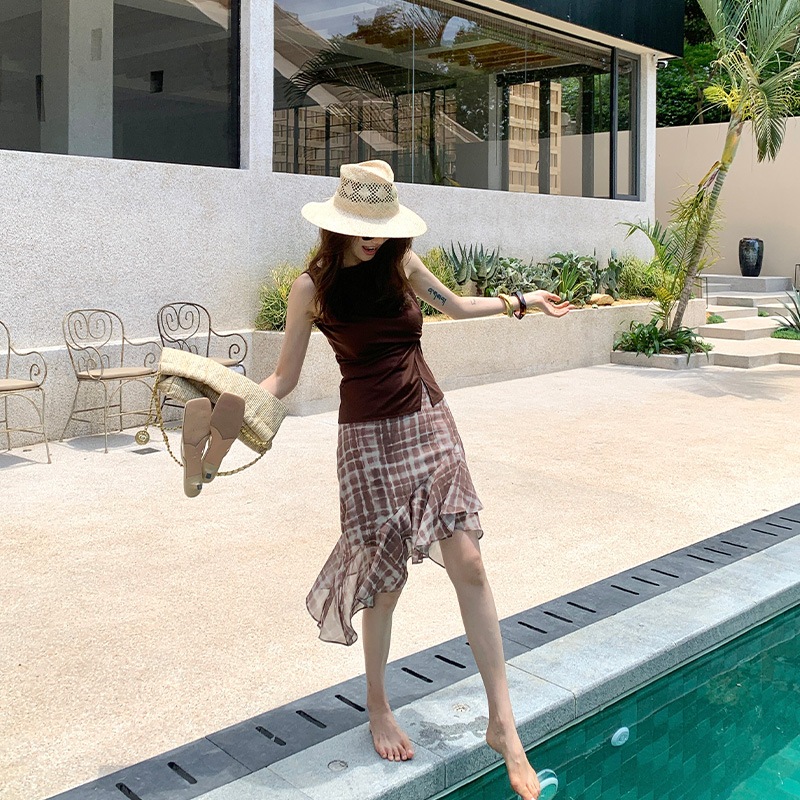 長いxier薄いホリデースタイル夏の女性のための不規則なフリルシフォンスカート夏のハイエンドルーズヒップスカート