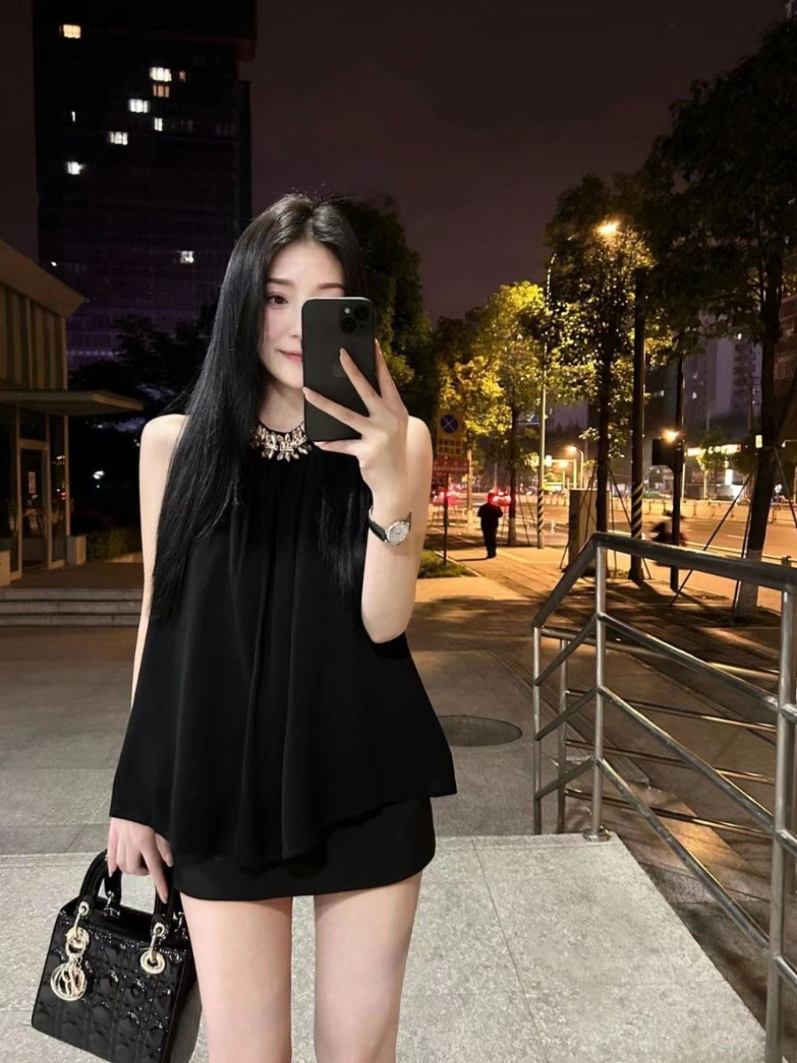 スーツの女の夏の高級感の小さい香風を着て掛けますダイヤの鎖の袖がありません首の上衣包の尻のミニスカートの2点セット