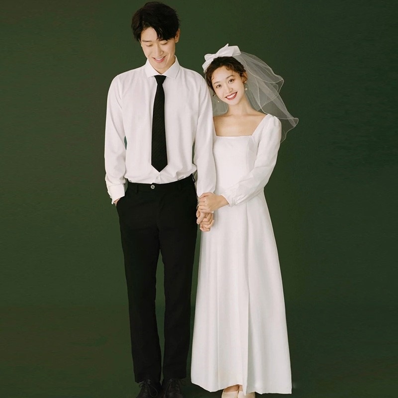 サテンの軽いウェディングドレス春の新しい旅行はレトロでシンプルな長袖の白い婚約ドレスを撮ります 5,767円