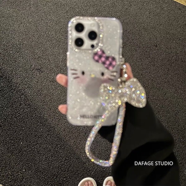 Qoo10] サンリオ スマホケース キラキラ キティ ipho