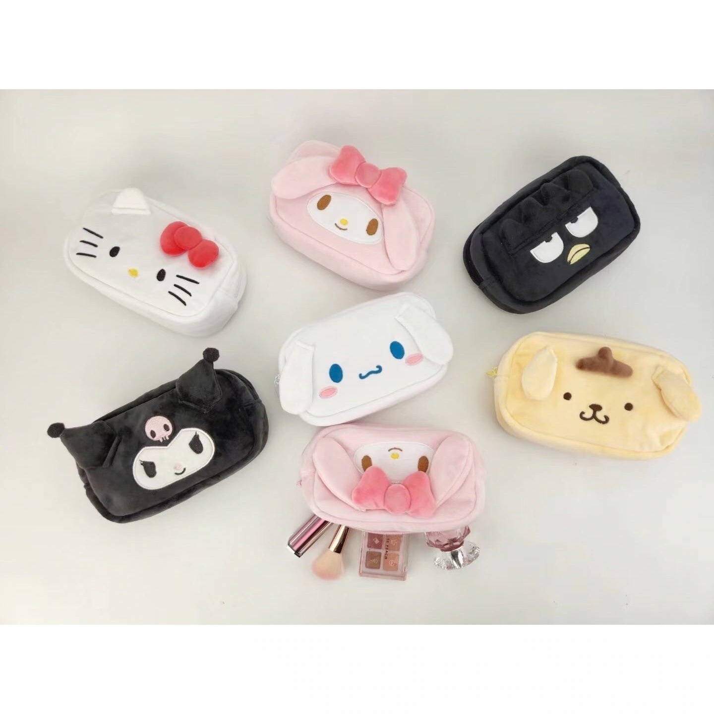 卸売リンク: 1つ買うと10個もらえる クロミ玉桂犬美楽ティプリンk/t猫サンリオ家族ぬいぐるみポーチ収納化粧ポーチ