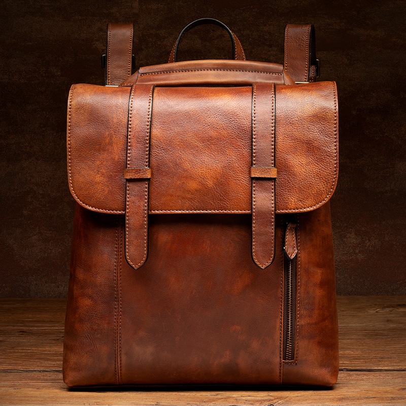 ゆっくりとした時間頭層植なめし牛革のランドセル純手拭の色の革のリュックサック学生の皮のランドセル男女のモデルの潮