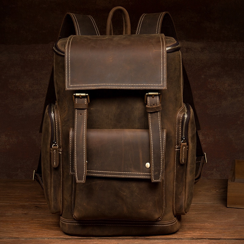 Mantimeレトロな狂った馬の皮のリュックサック手働の本革のリュックサック男性の包頭層牛革のレジャー旅行リュックサックです