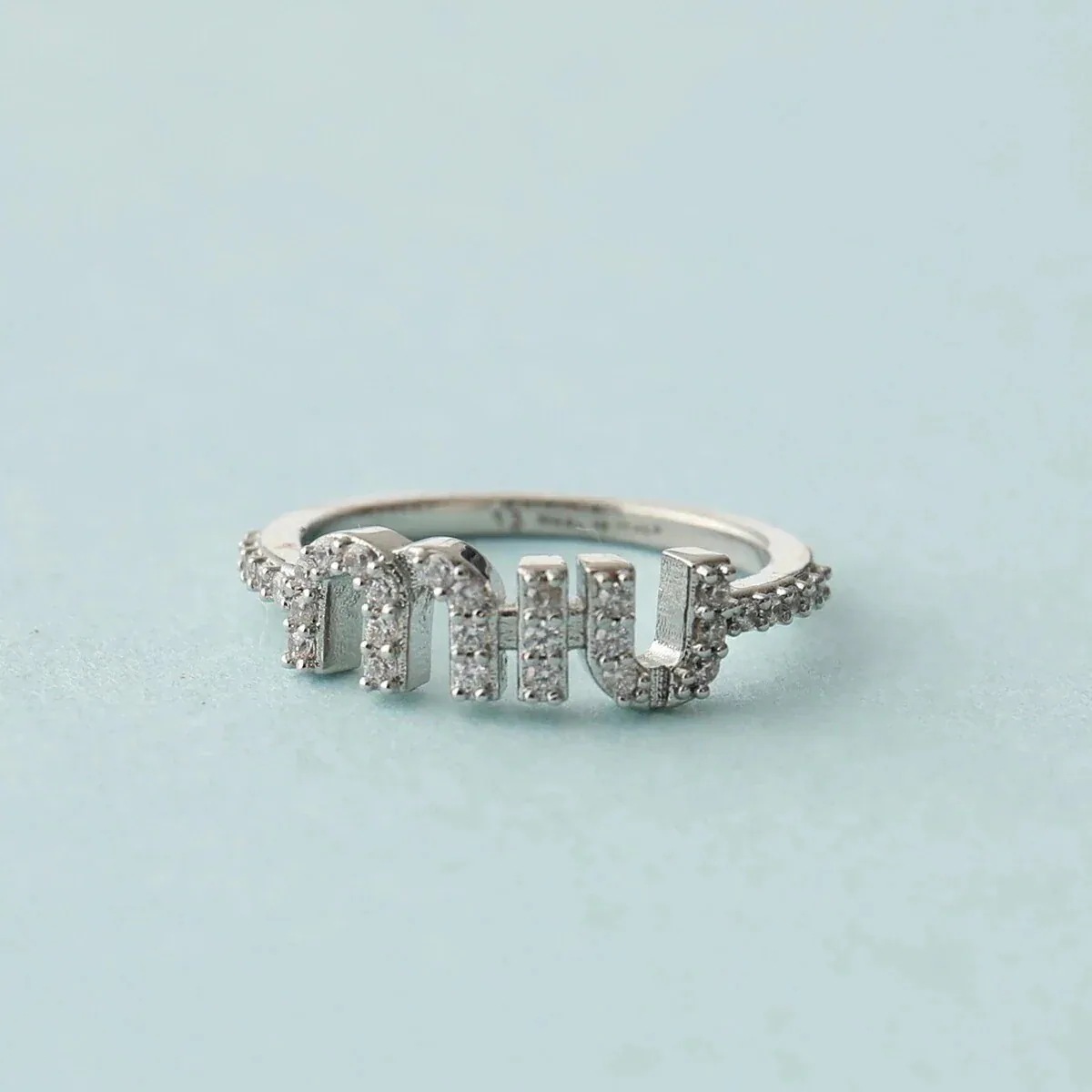 MIUMIU ミュウミュウ リング 5JA091 2DNC レディース ロゴ 指輪 アクセサリー クリスタル装飾 F0OKL/ACCIAIO+CRYSTAL