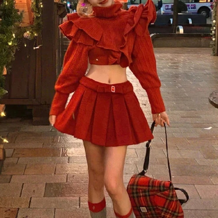 クリスマスと新年にぴったりな春と秋向けのエレガントなツーピースセットショート丈のフリルセーターとプリーツミニスカート