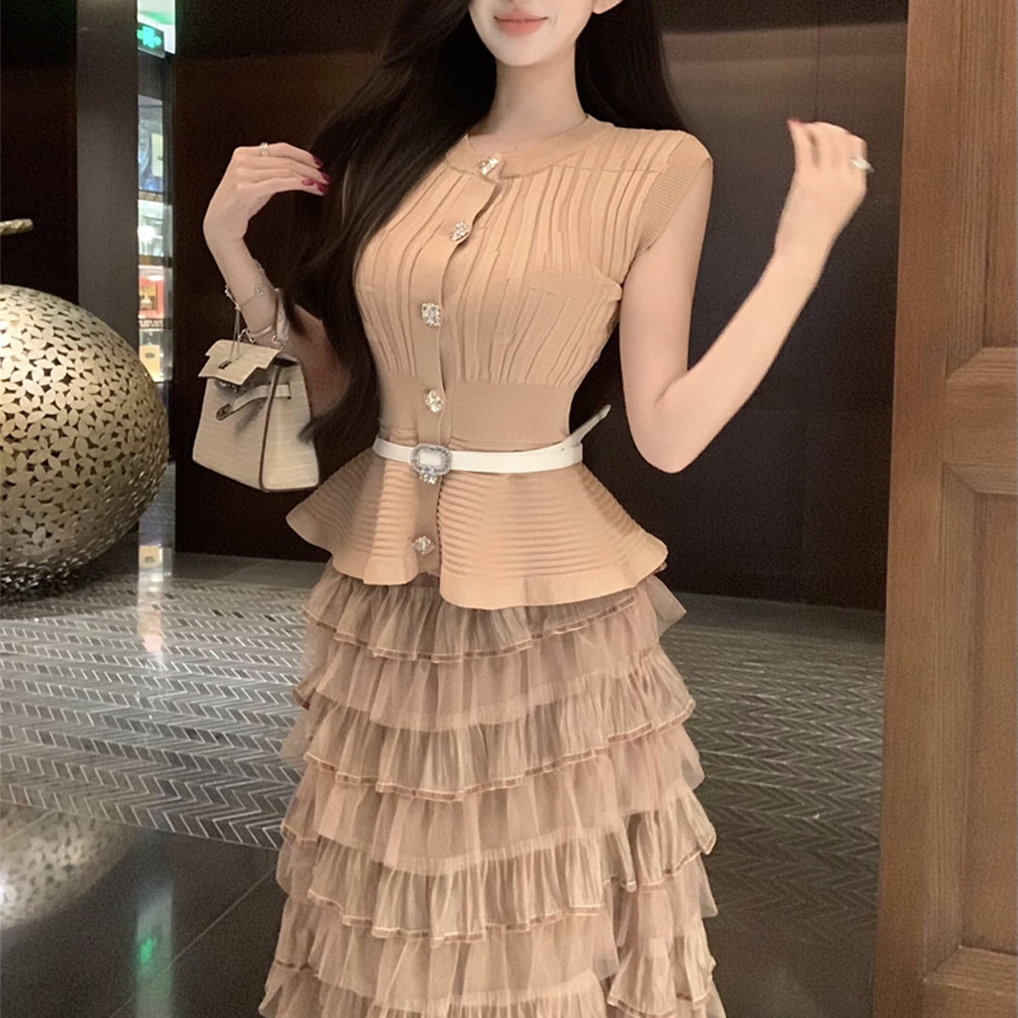 ペプラムベルト付き合わせやすいニットベスト夏 5,771円