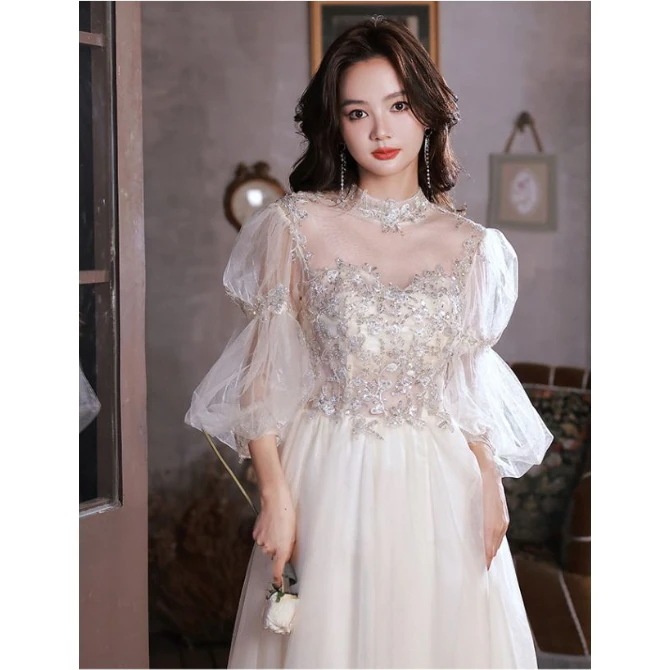 シャンパンカラーイブニングドレス新しいスタイル夏エレガントスーパーフェアリーアート宴会ハイエンドライトラグジュアリードレス30%制限