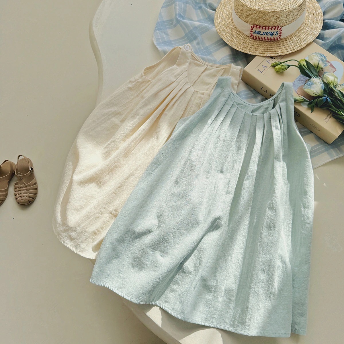 【1つ買うと10つ無料】プリーツの袖なしの女の子のドレス2025夏のハイエンドホリデーバックレスルーズベストスカート