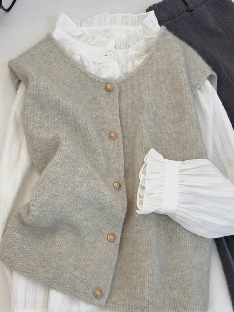 フレンチスタイルのスタンドカラーの白いシャツレディース2025年初秋の新スタイルシャツベストとの重ね着多用途