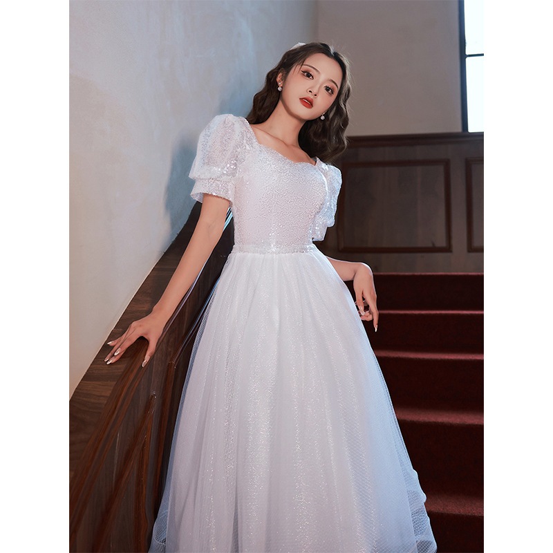 白いドレスのスカートの女性の宴会の仙気質の軽い豪華な大衆のハイエンドの王女のスカートのフランスの小さい子の誕生日の芸考