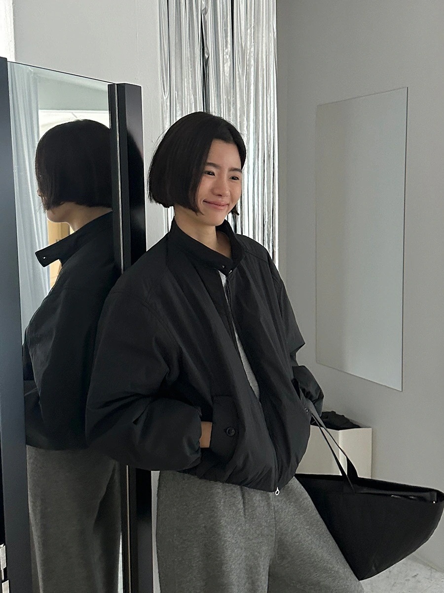 韓国のシンプルなファッションの綿のジャケットの秋の緩い薄いカジュアルなスタンドカラージャケット