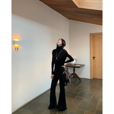 黒い高腰の小さいラッパのズボンの女性の秋冬のメリヤスの修身は絨毛のカジュアルなズボンをつかみます