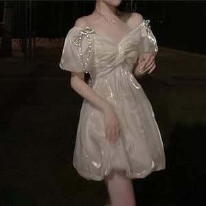フランスのビーズのドレスの夏新しいウエストレトロ蝶デザインセンスニッチ妖精ビーチスカート
