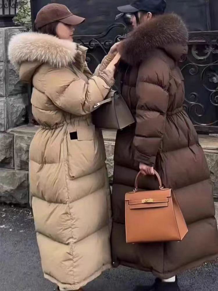 2025新しい冬の大きな毛むくじゃらの襟は女性のダウンジャケットのコートの暖かい韓国語バージョンを厚くし長く白いダックダウンフード付き 8,805円