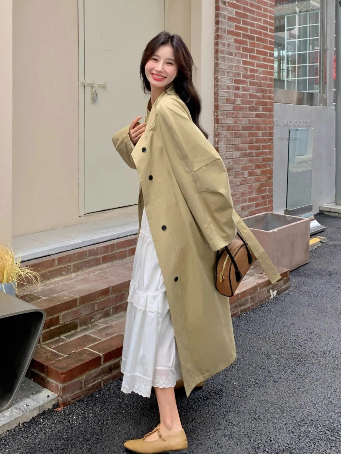 福袋2025大人気 カーキ色のカジュアルコートの女性の秋の服の新型の韓国版の高級感の気質の英倫の長いタイプのコート 4,792円