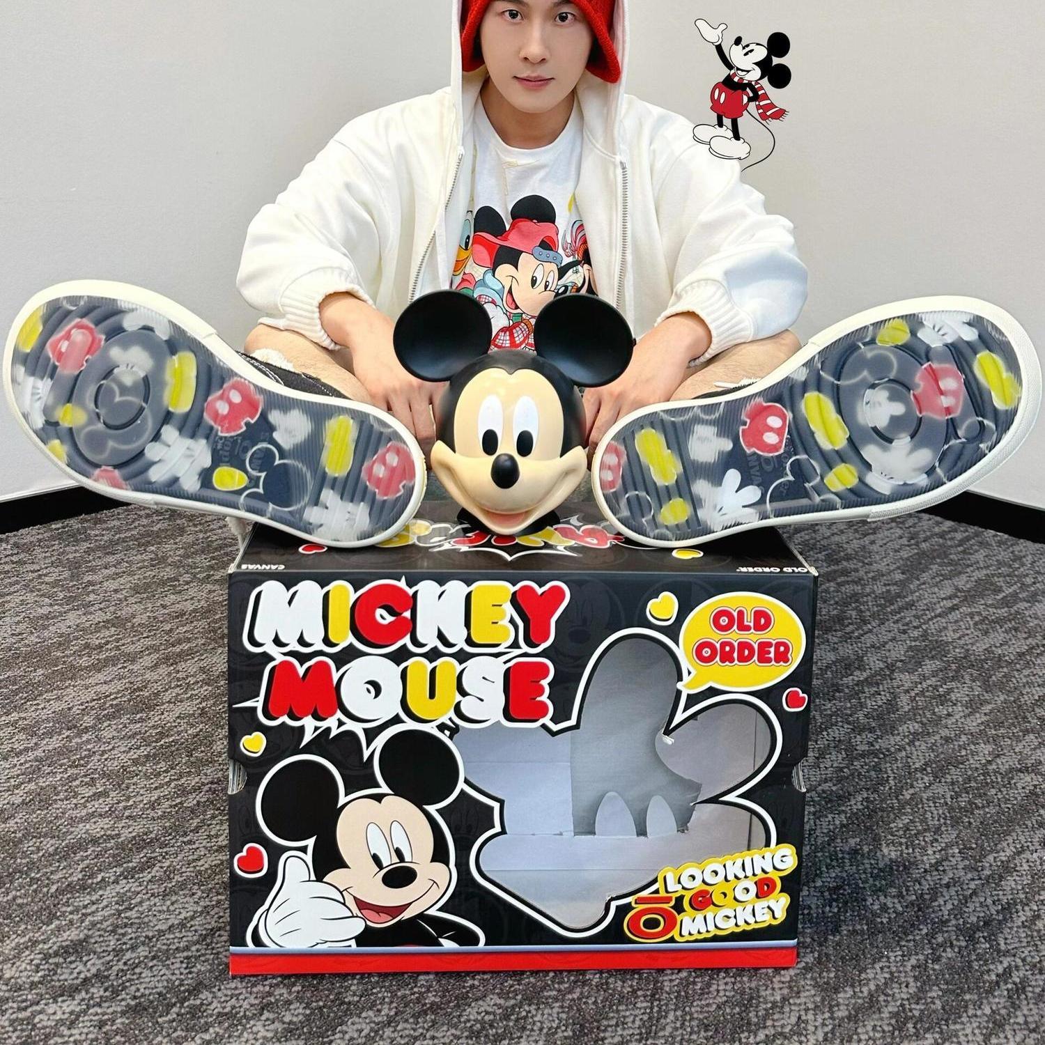 国潮ミッキー2025春の新型の大きい頭の黒いキャンバスの靴の男女のタイプの厚い底のカップルのカジュアルな板の靴