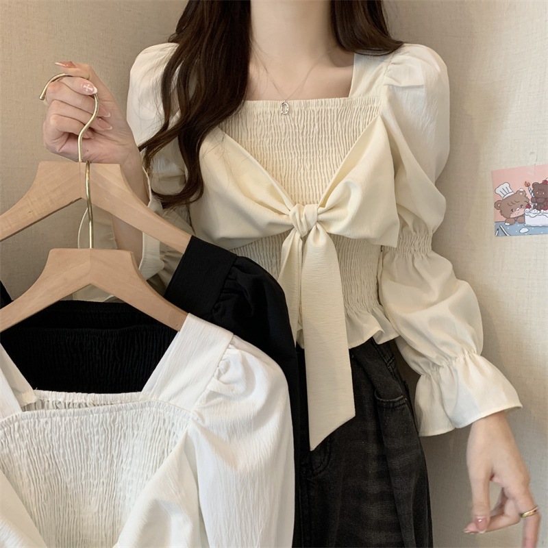 3カラー トップス レディース 長袖 フリル ボリューム袖 パフスリーブ フロントデザイン リボン シャーリング ホワイト 白 アプリコット ブラック 黒 キュート 女の子らしい 女性らしい ガーリー