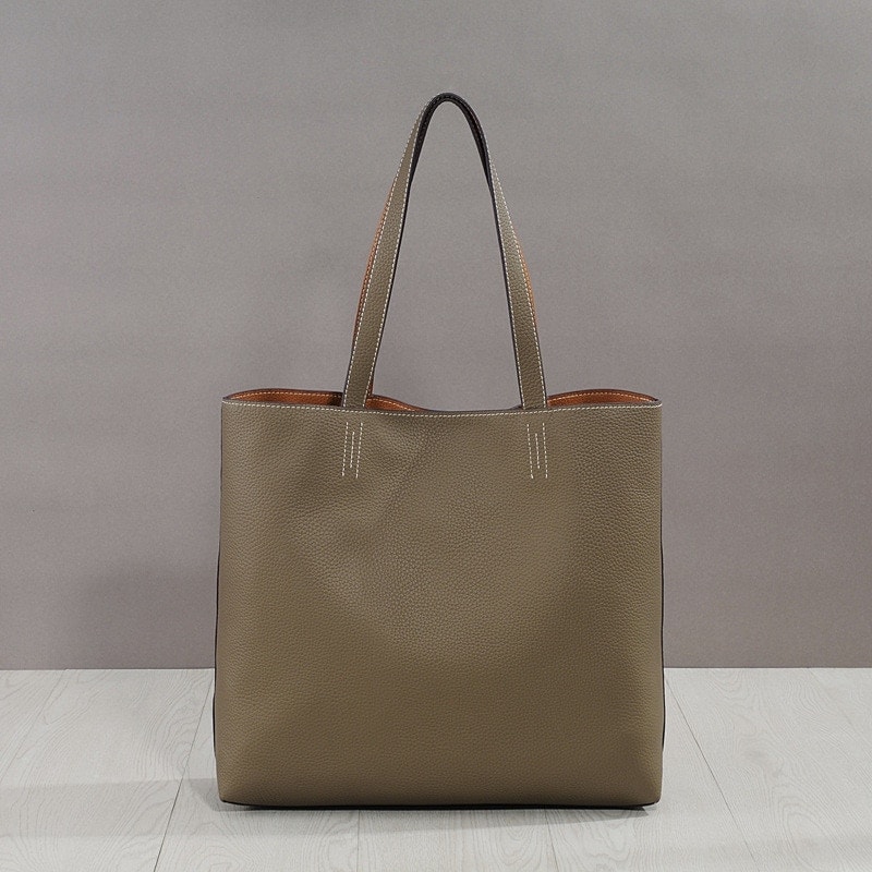 女性の両面両用大容量大容量大容量大容量大容量本革バッグ女性の手提げ単肩 縦型