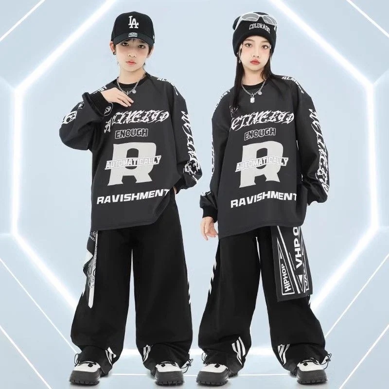 街のダンスのスーツのファッション服の男子学生は子供のヒップホップのhiphopの女子学生の秋冬のファッションのブランドのショーの服のクールでかっこいいスーツを演出します