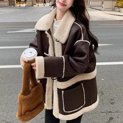 毛皮と毛皮の一体羊の毛皮のコート女性の冬の新しい毛皮の厚い毛皮のコート