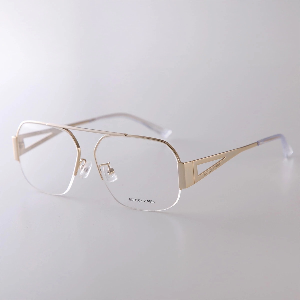 BOTTEGA VENETA ボッテガヴェネタ メガネ BV1067O レディース ティアドロップ型 メタルフレーム ダブルブリッジ クリングス 002/GOLD-GOLD-TRANSPARENT