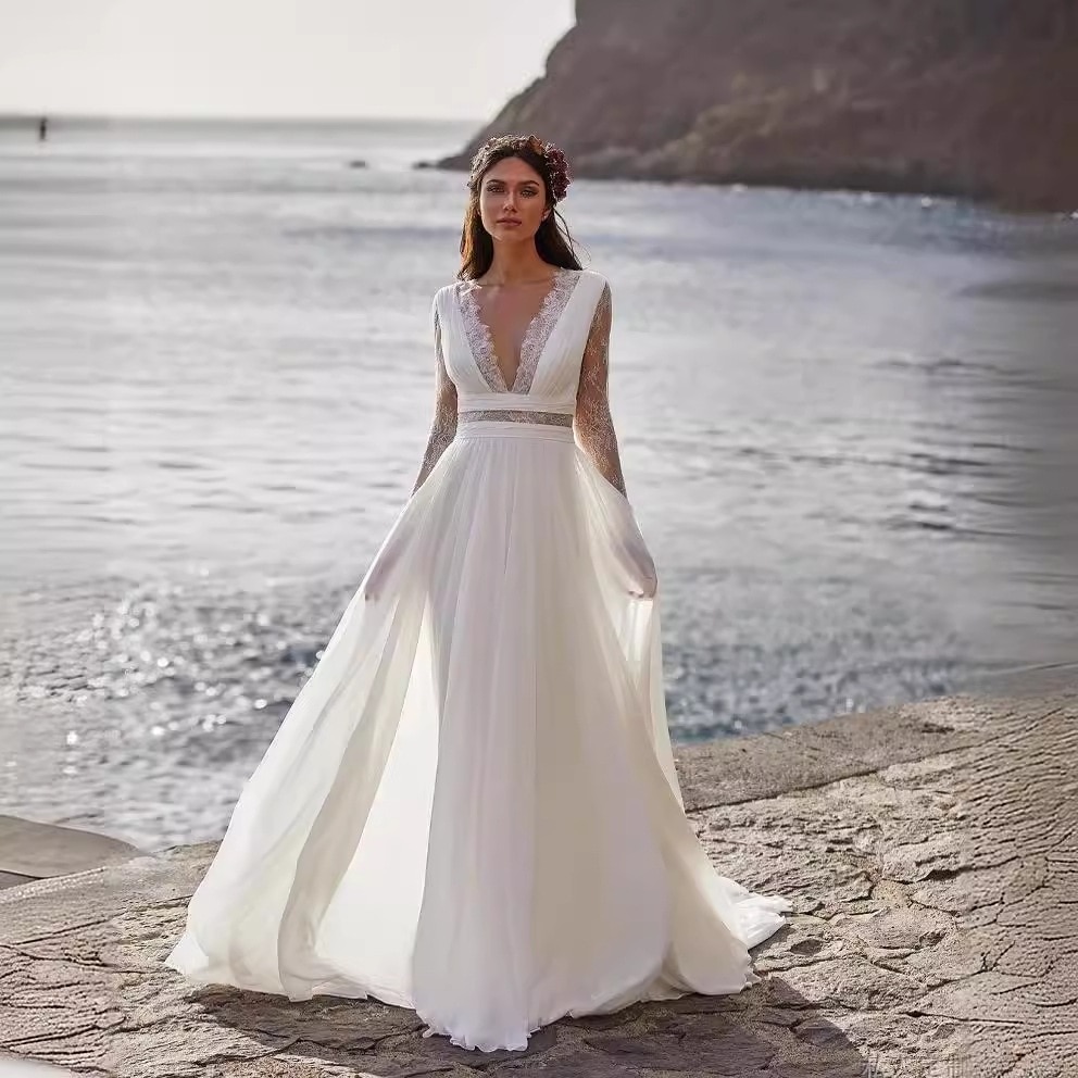 春の新型長袖の小さい尾の旅行は屋外の軽いウェディングドレスをたたいてショーのドレスを歩きます