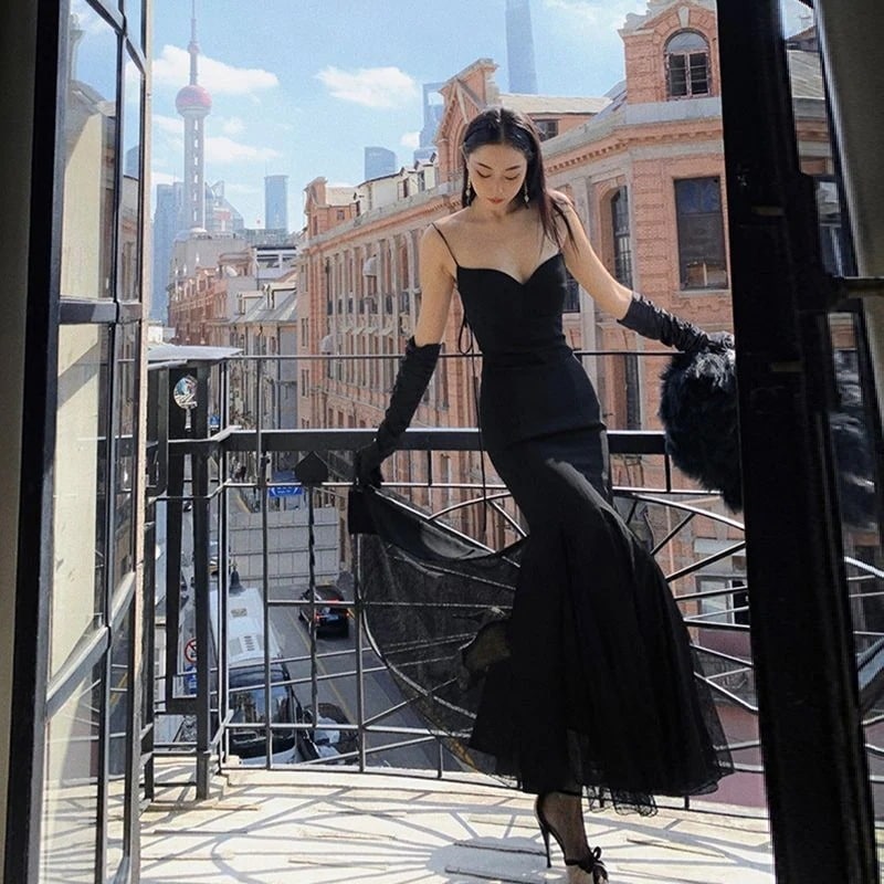 スカートロングスカート新しいレディースファッション黒サスペンダーヒップドレスハイセクシースリムロングスカート