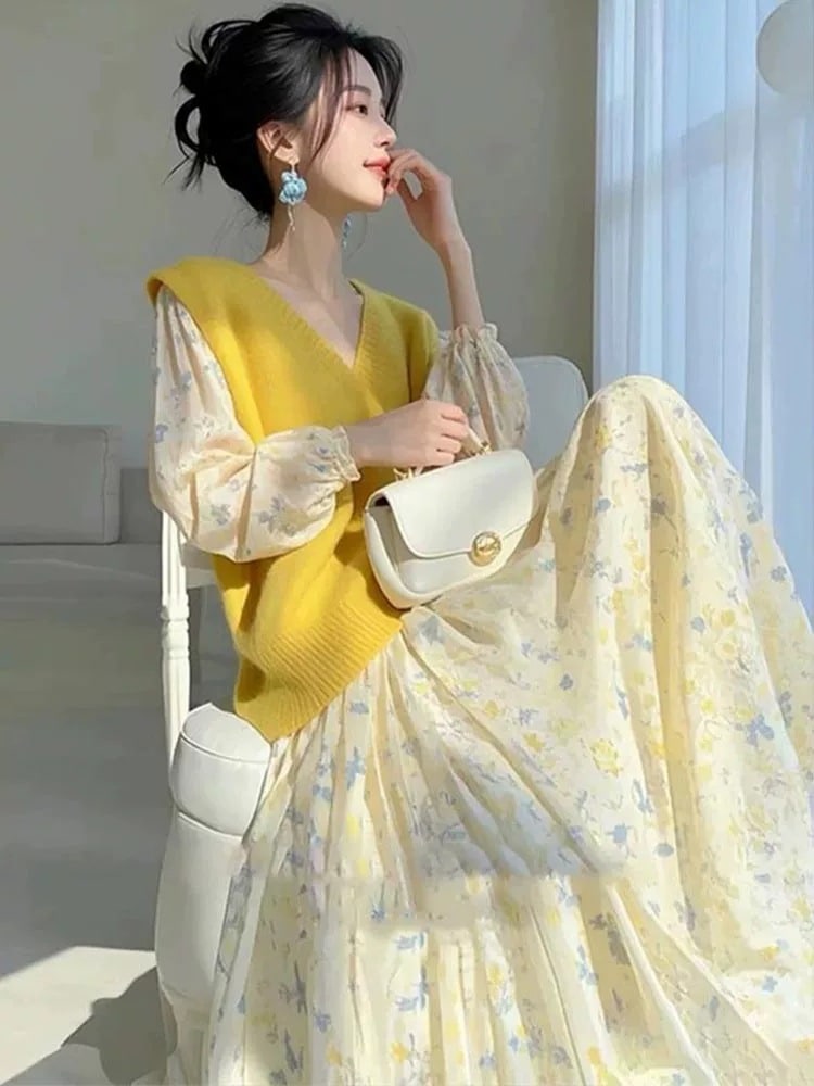 一セットの高級感の女装独特のきれいで優しい気質は軽く熟乳黄色の花柄のスカート+セーターのセットです 6,098円