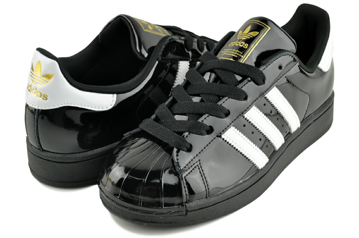 スーパースター 2 ウィメンズ コアブラック フットウェアホワイト ゴールドメタリック js4009