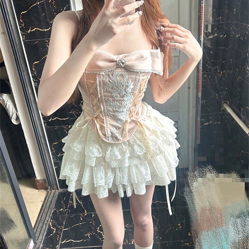 韓国風の甘いリボン結びの純粋で魅惑的なデザインのレディース夏スリムフィットトップスとふわふわケーキスカートのツーピースセット