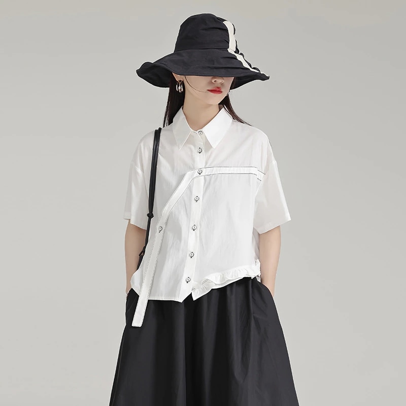 デザイン感は木の耳元シャツの女性の夏の半袖の甘いクールな風の独特な上着通勤トップス